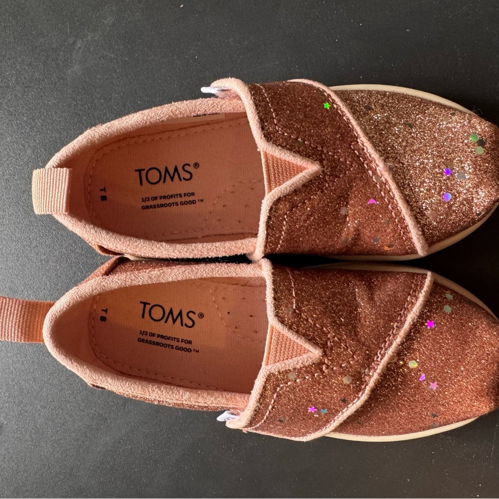 TOMS Rose Gold Glitter Slip-Ons